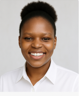 Miriam K smiling in a white shirt